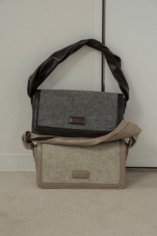combination material shoulder twist bag