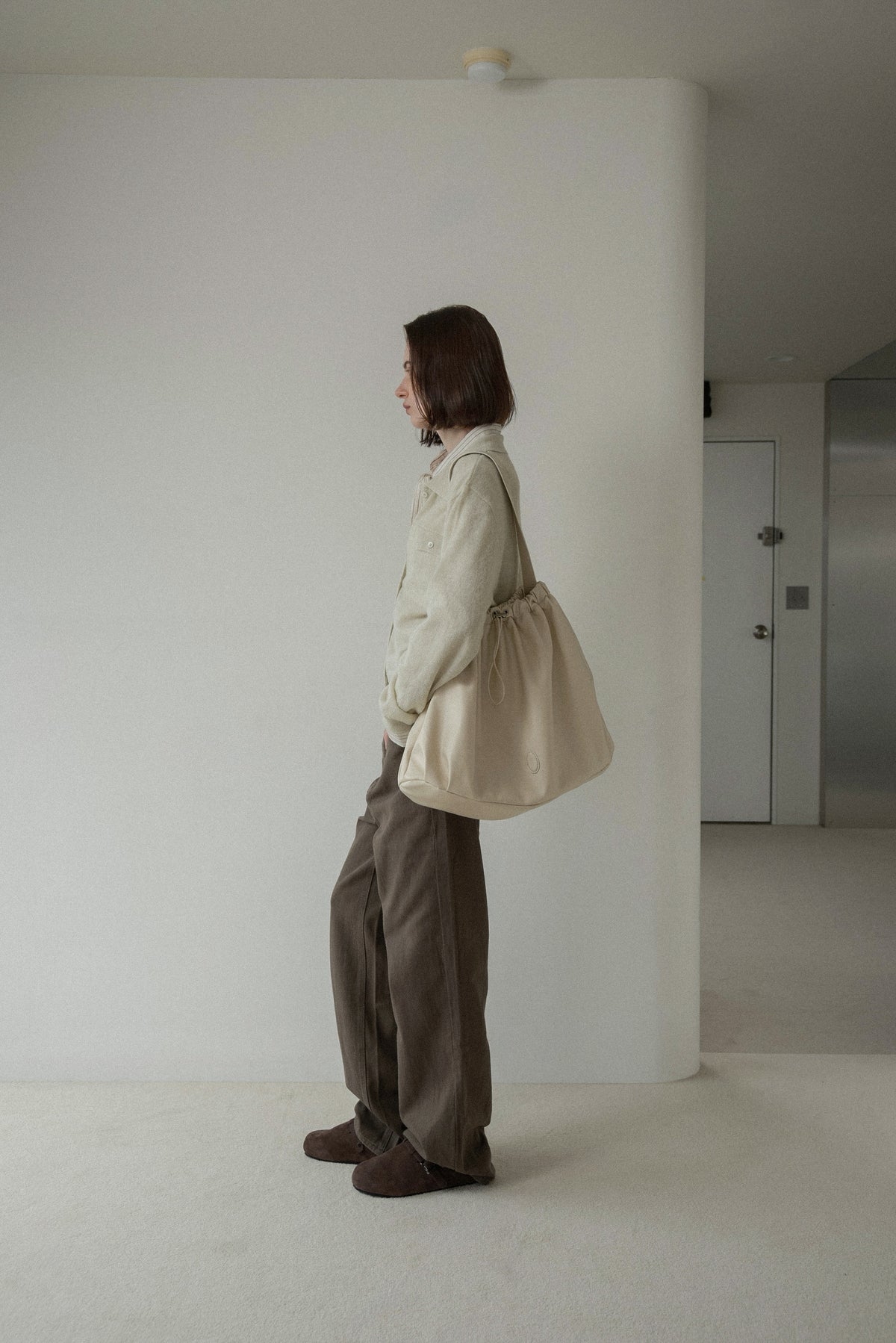 big circular form single handle gather bag