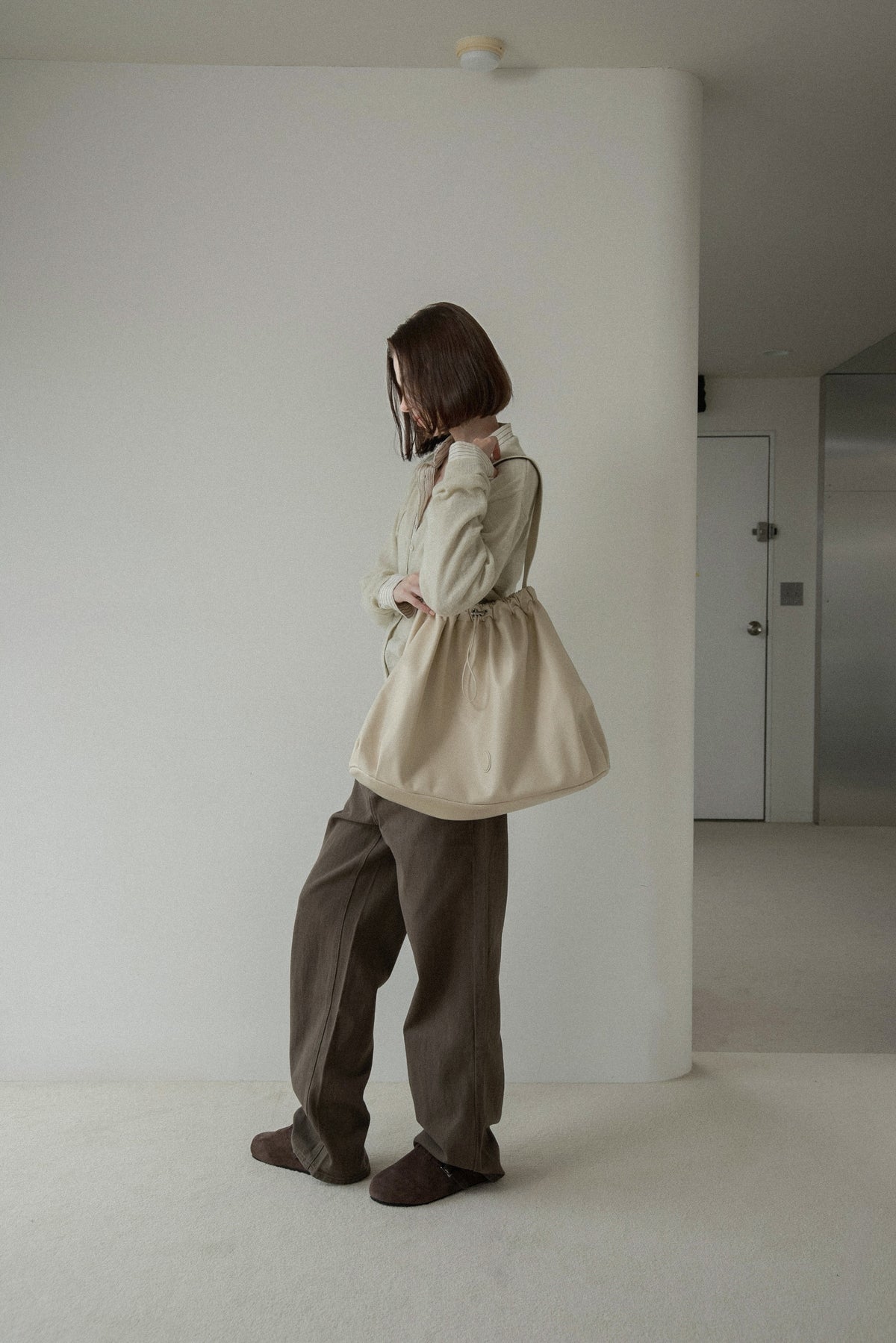 big circular form single handle gather bag