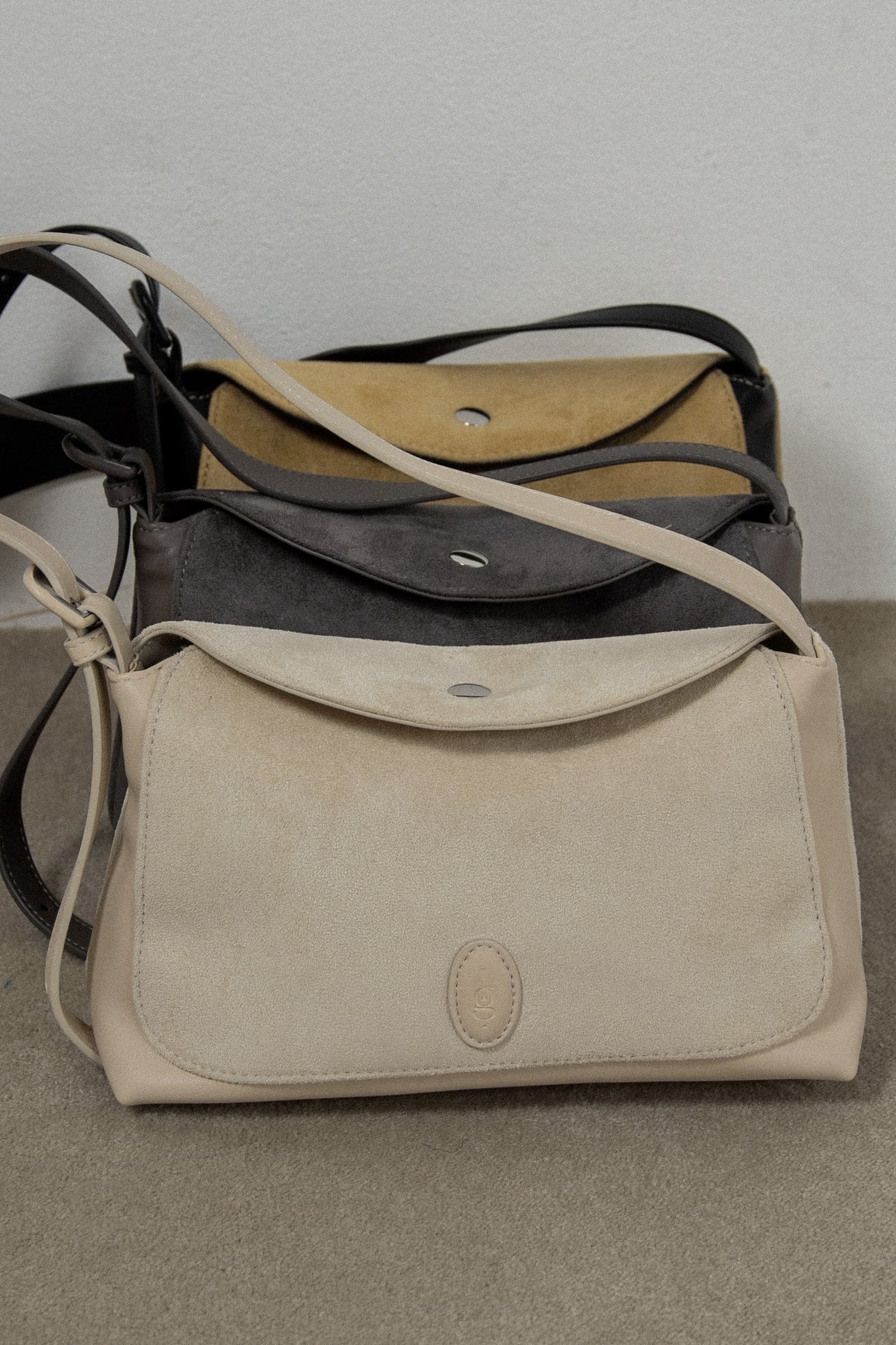 emboss patch round flap one handle bag