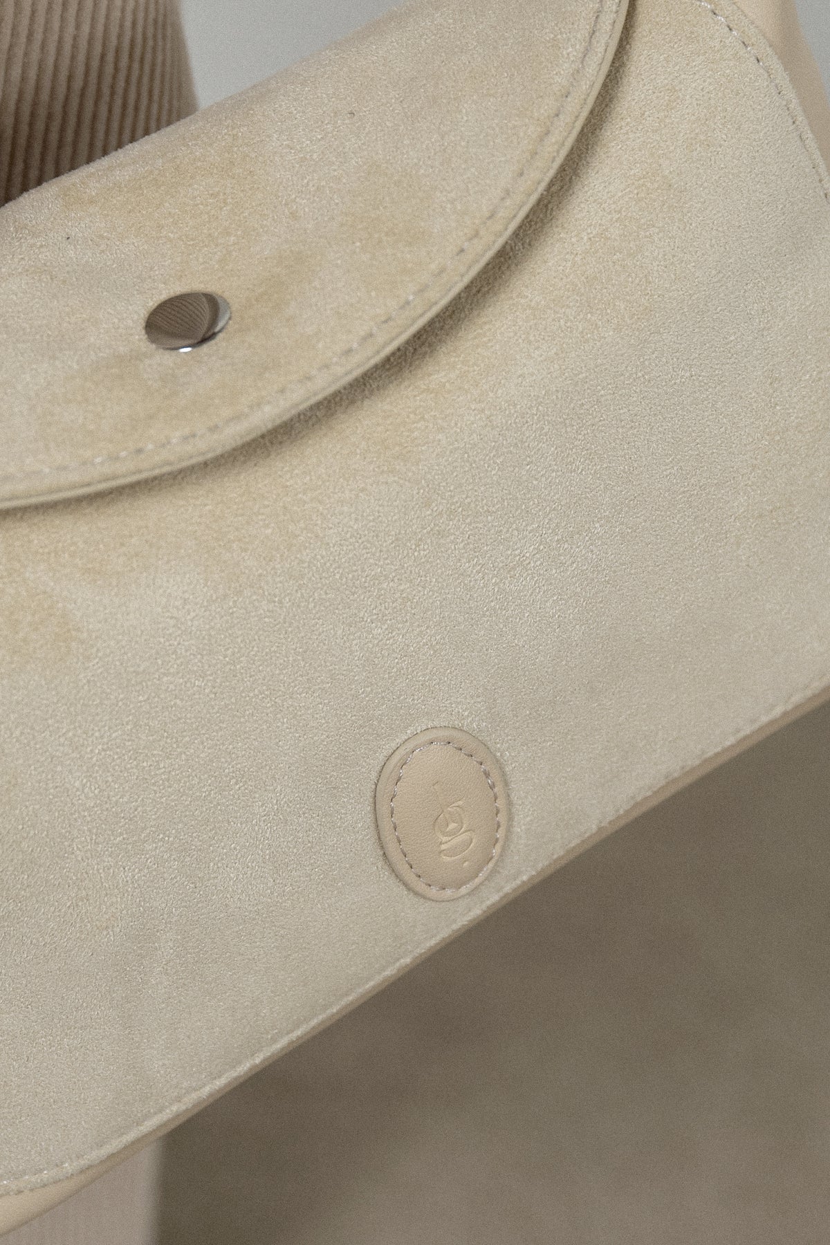 emboss patch round flap one handle bag