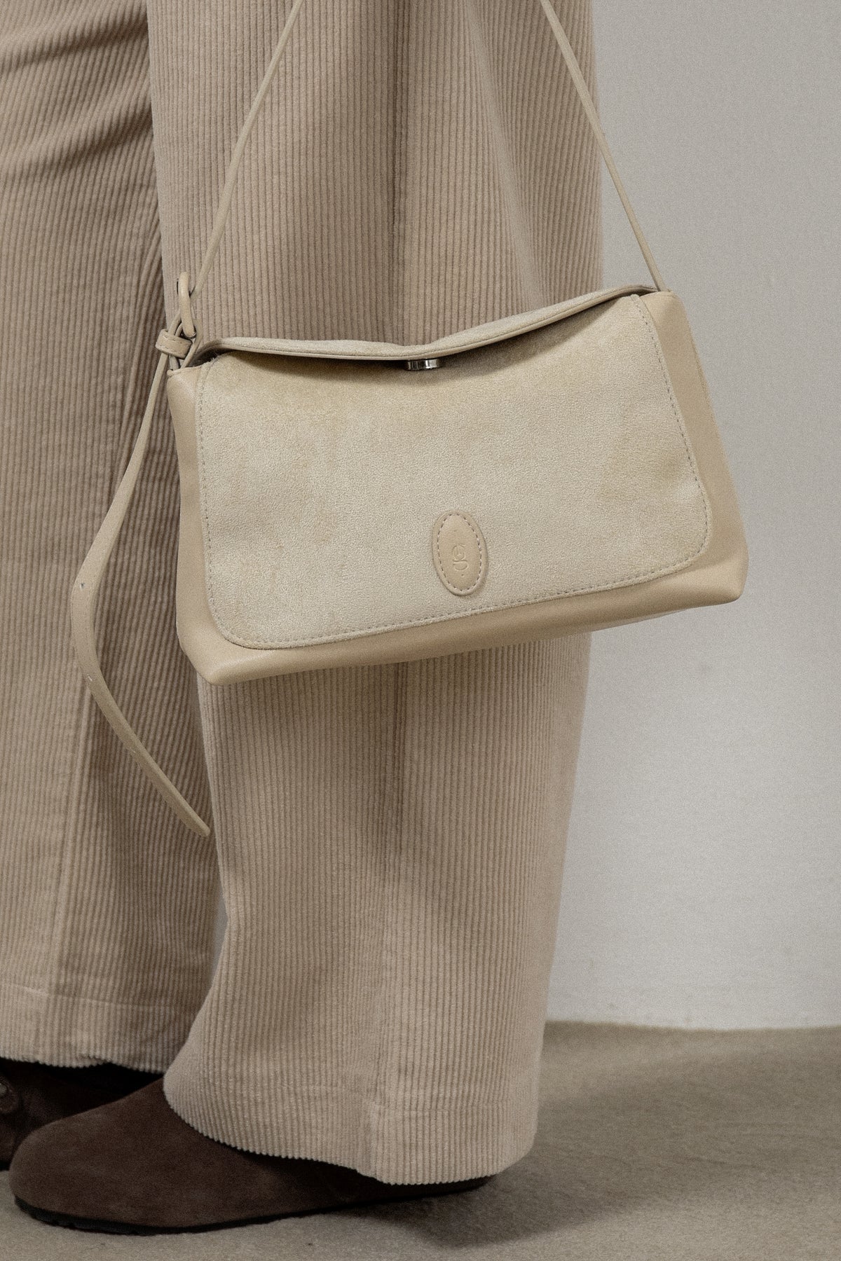 emboss patch round flap one handle bag