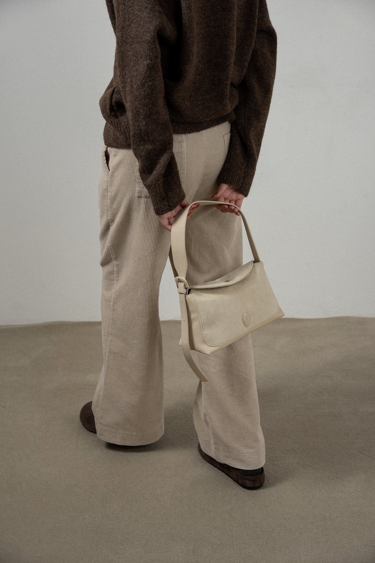 emboss patch round flap one handle bag