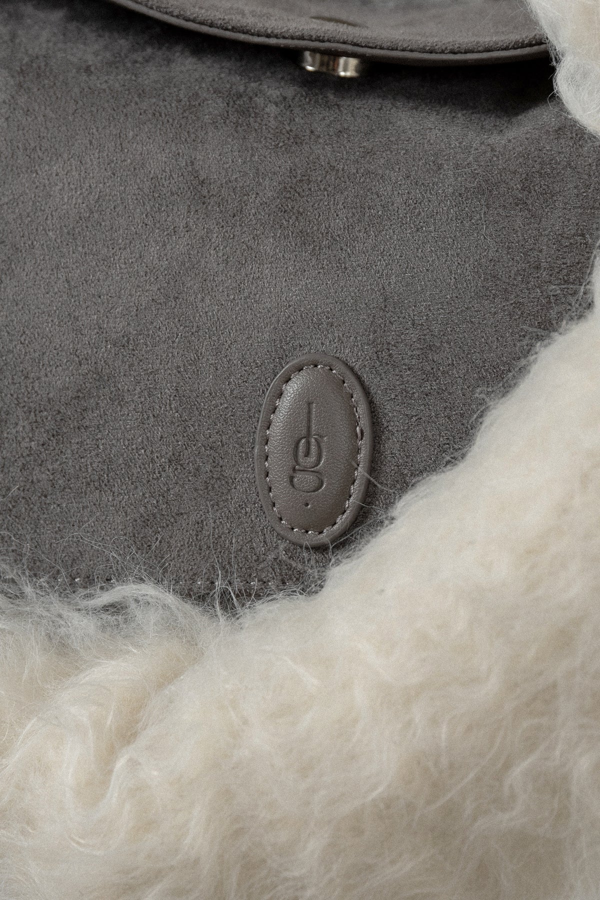 emboss patch round flap one handle bag