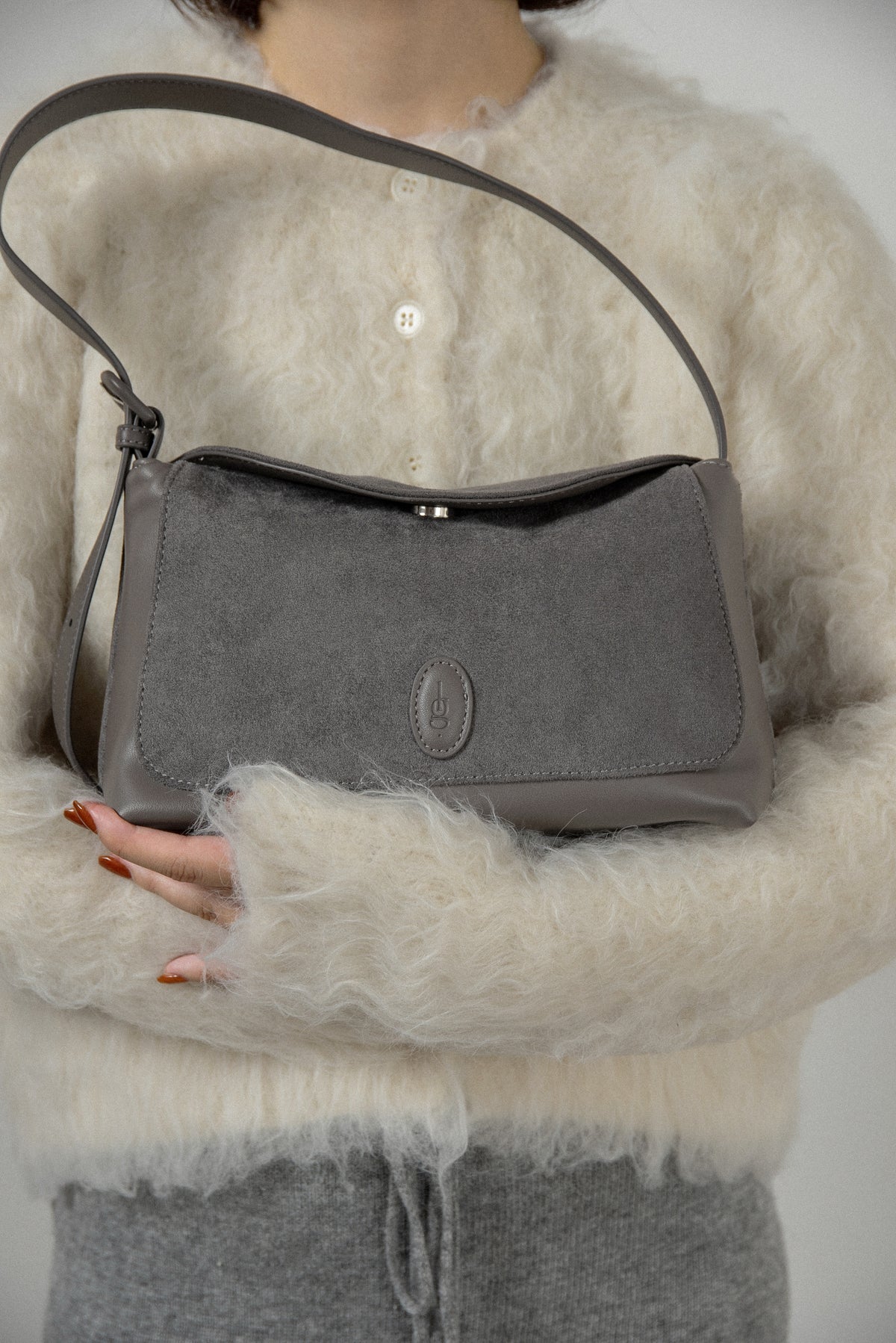emboss patch round flap one handle bag