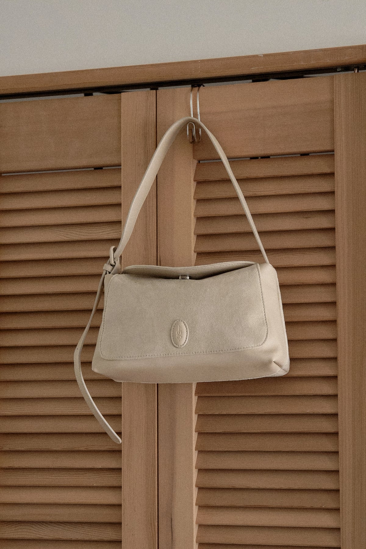 emboss patch round flap one handle bag