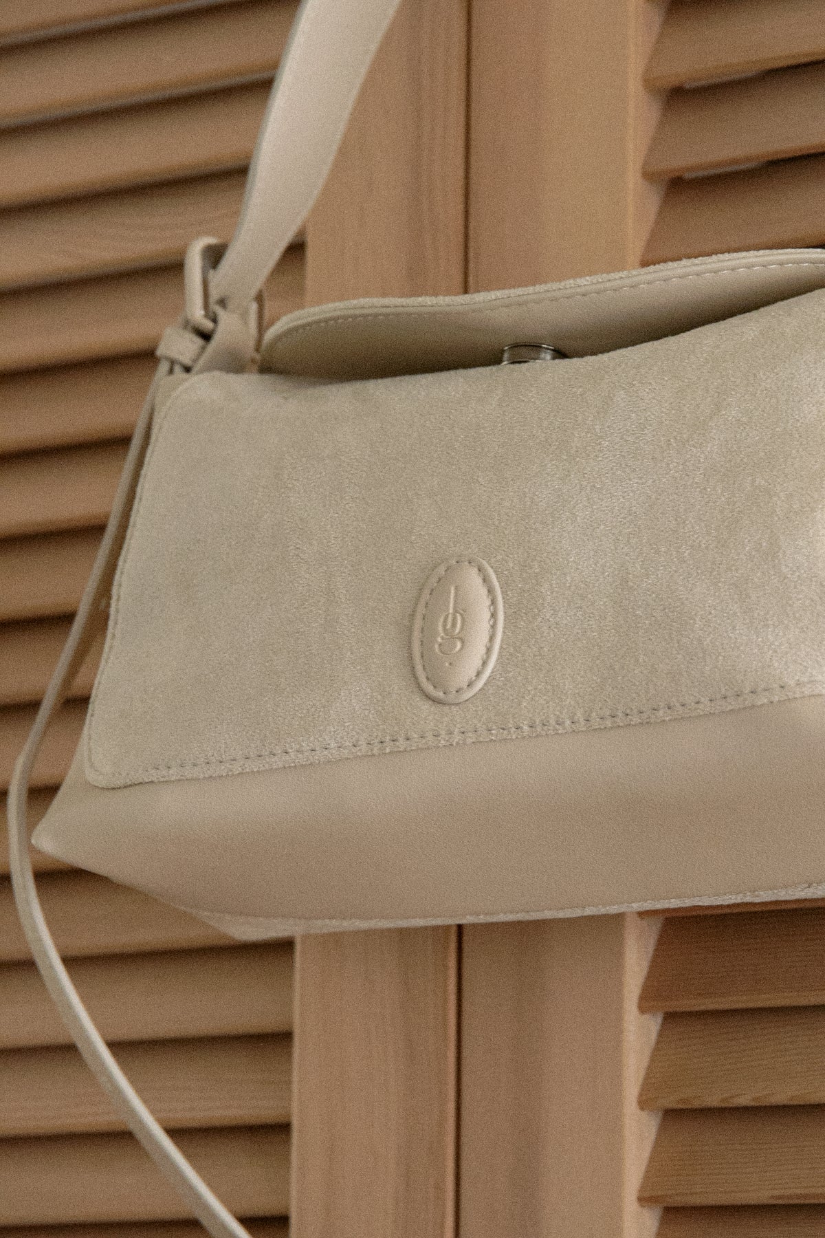 emboss patch round flap one handle bag