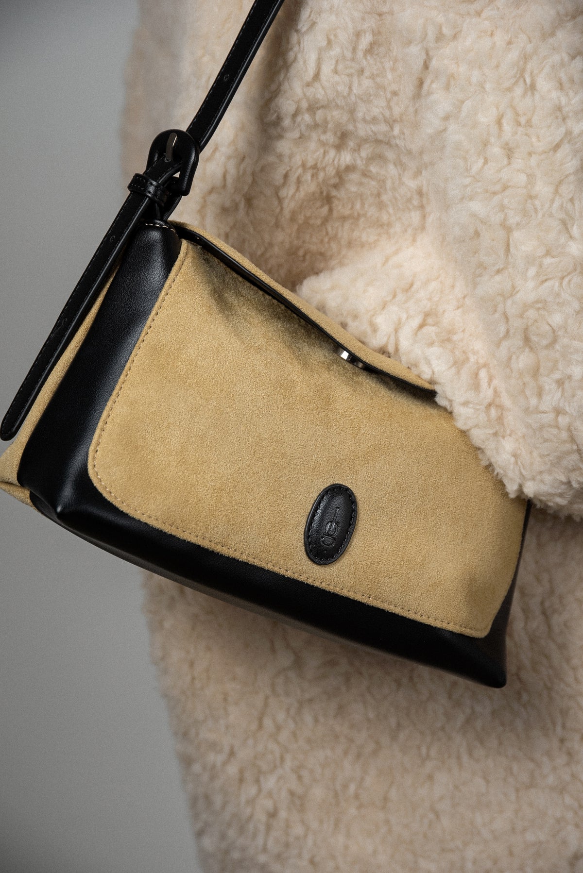 emboss patch round flap one handle bag