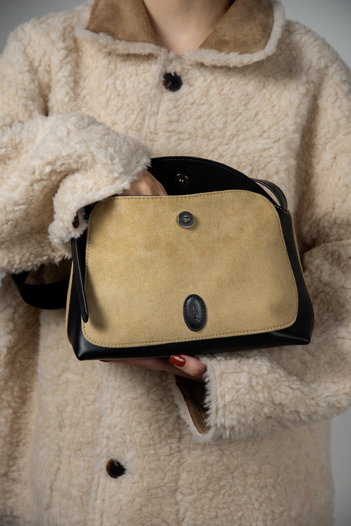 emboss patch round flap one handle bag