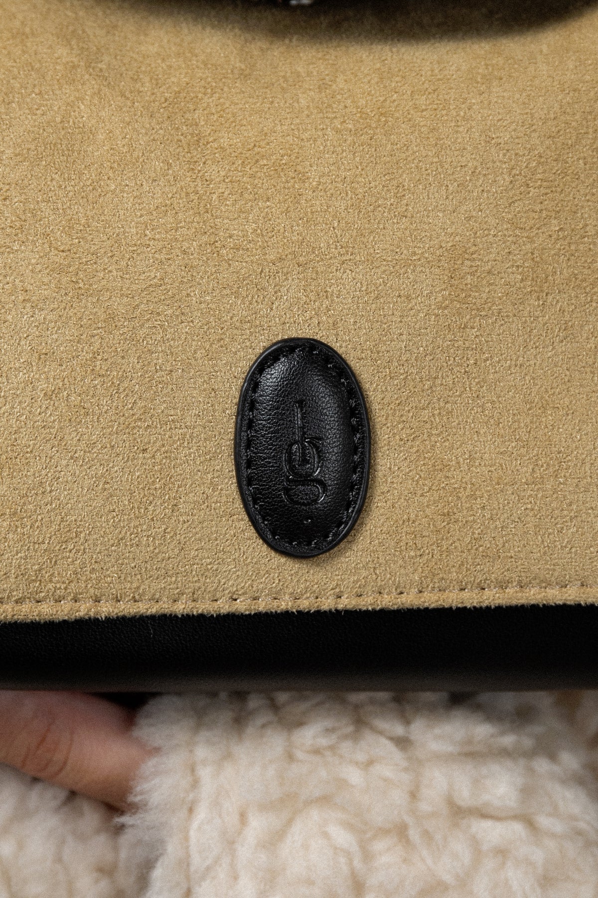 emboss patch round flap one handle bag