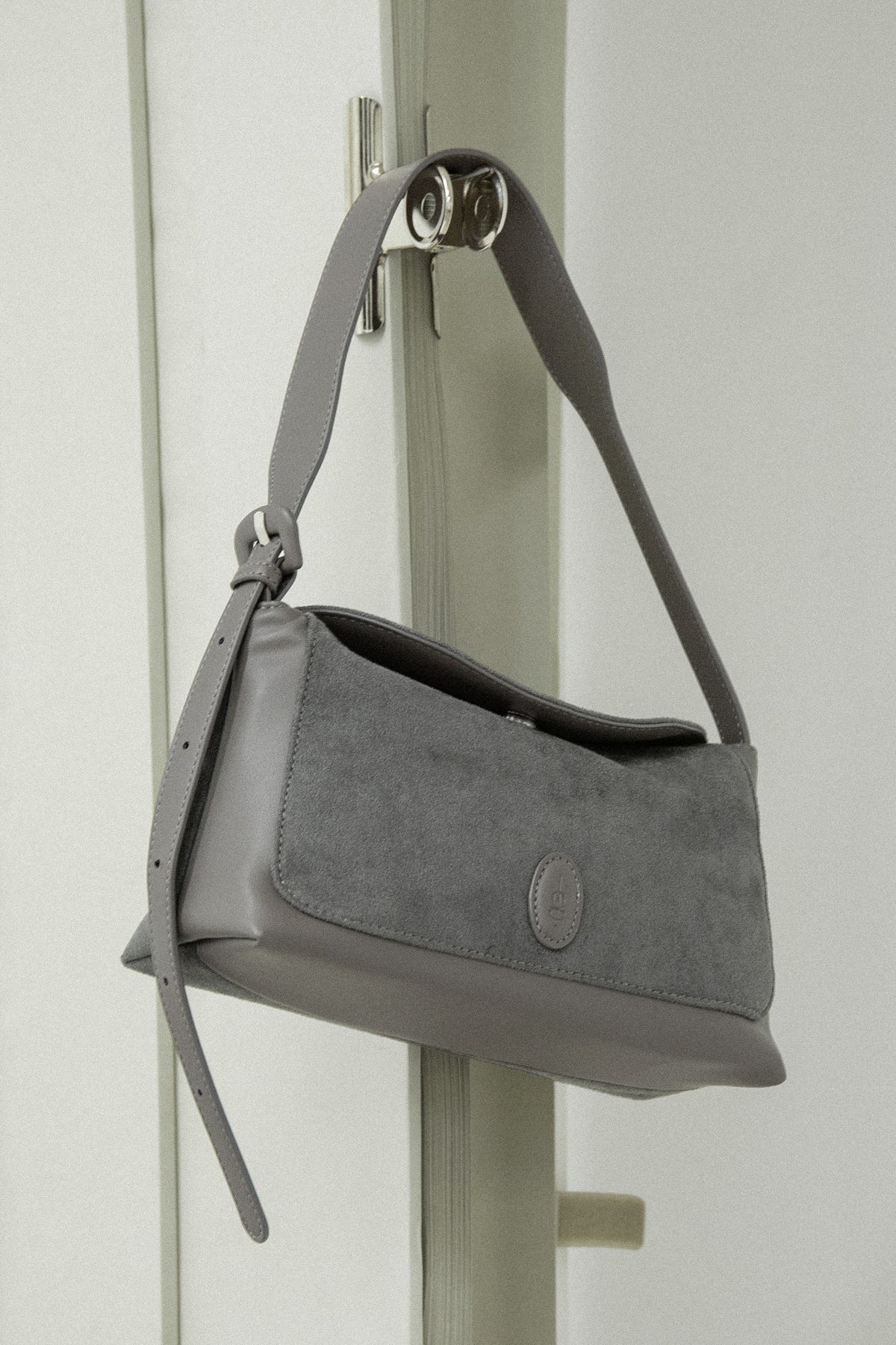 emboss patch round flap one handle bag