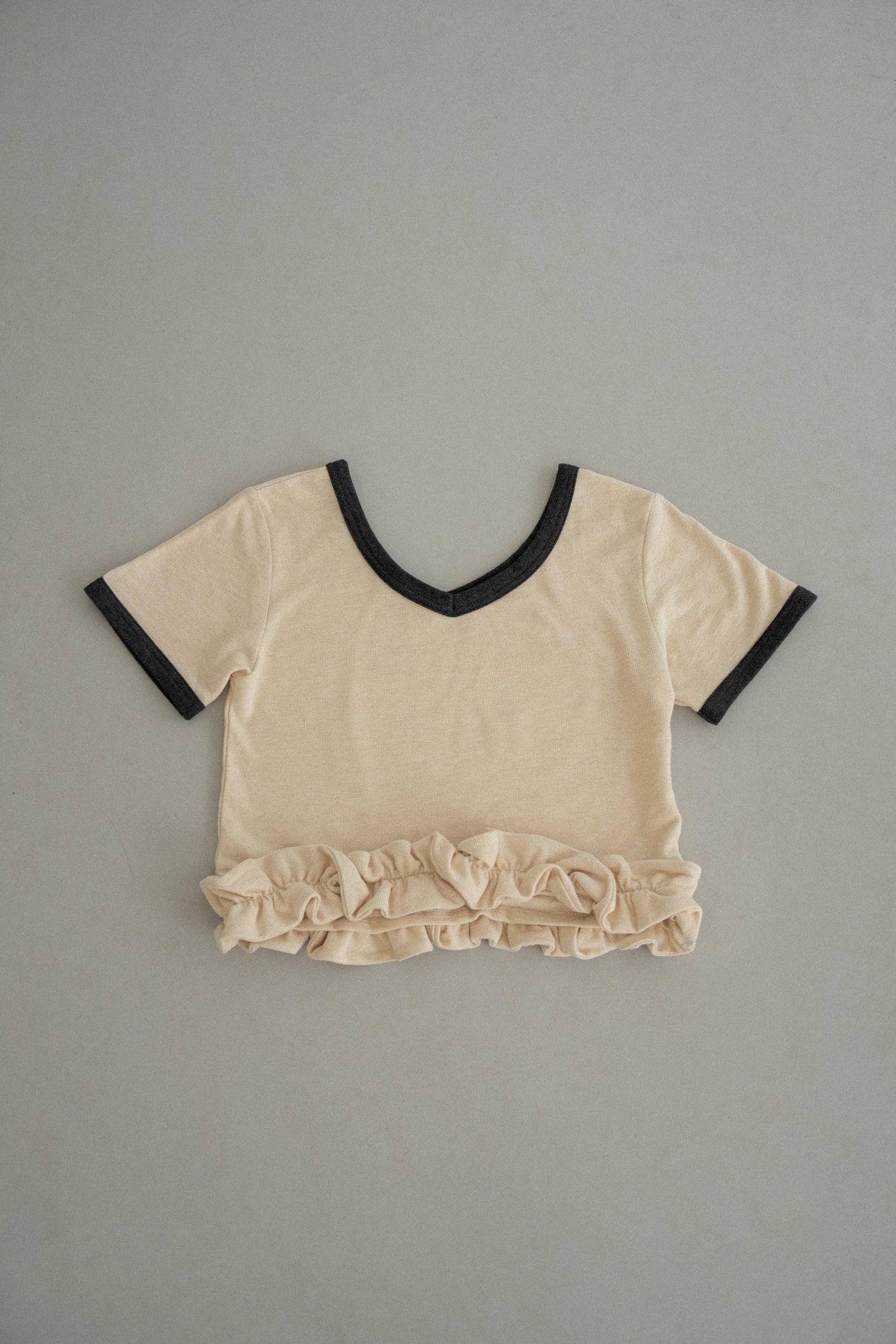 bicolor hem ruffle v tops