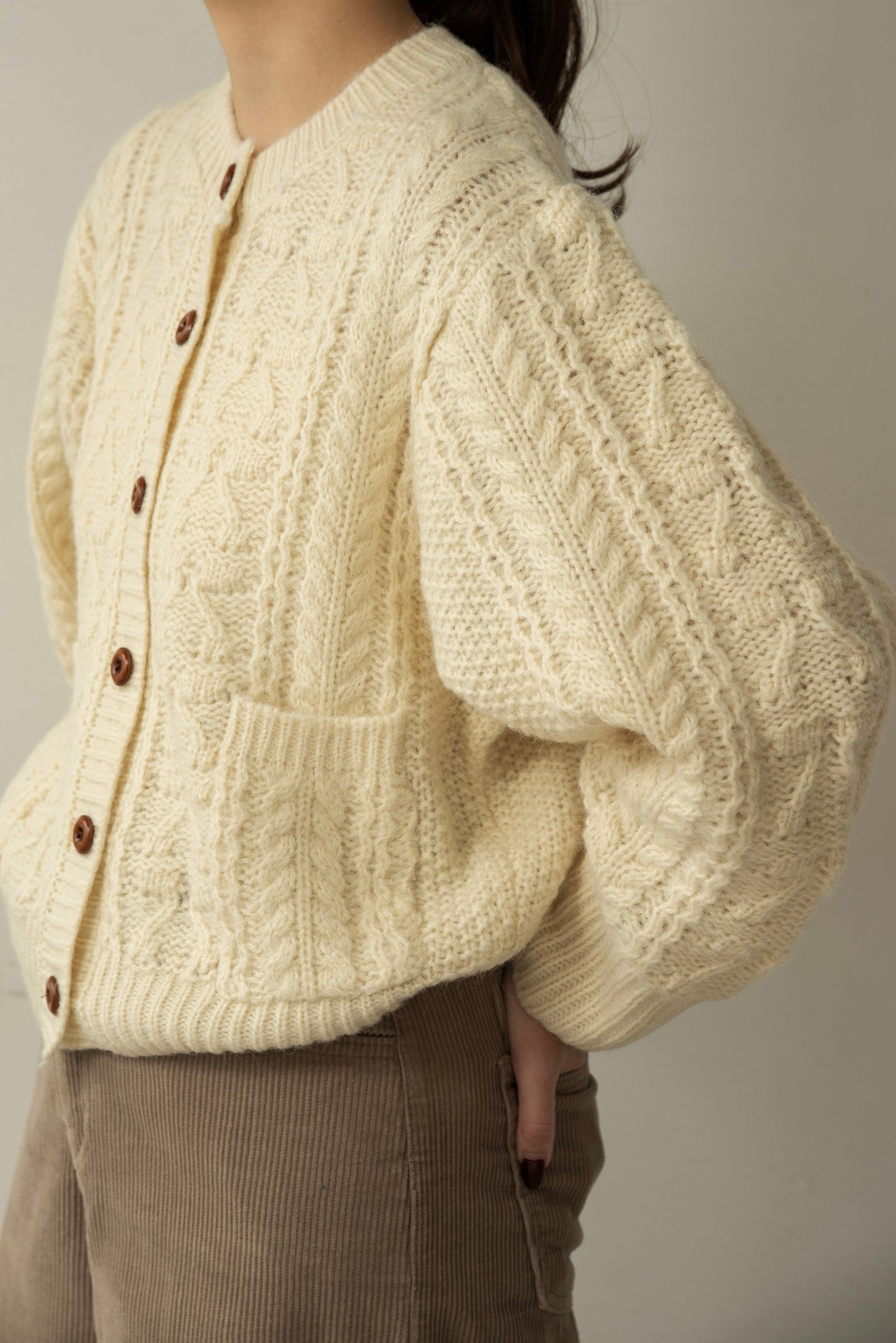 wood button like pocket cable cardigan