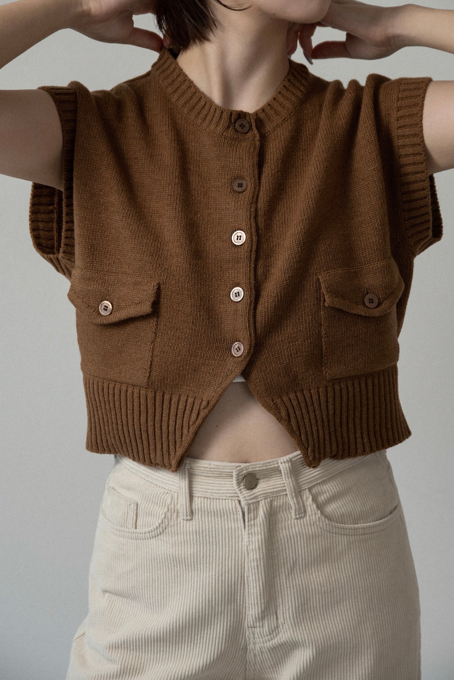 flap pocket effortless knit vest