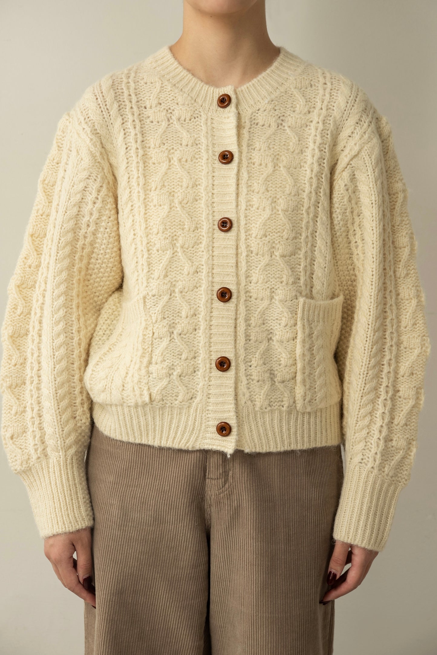 wood button like pocket cable cardigan