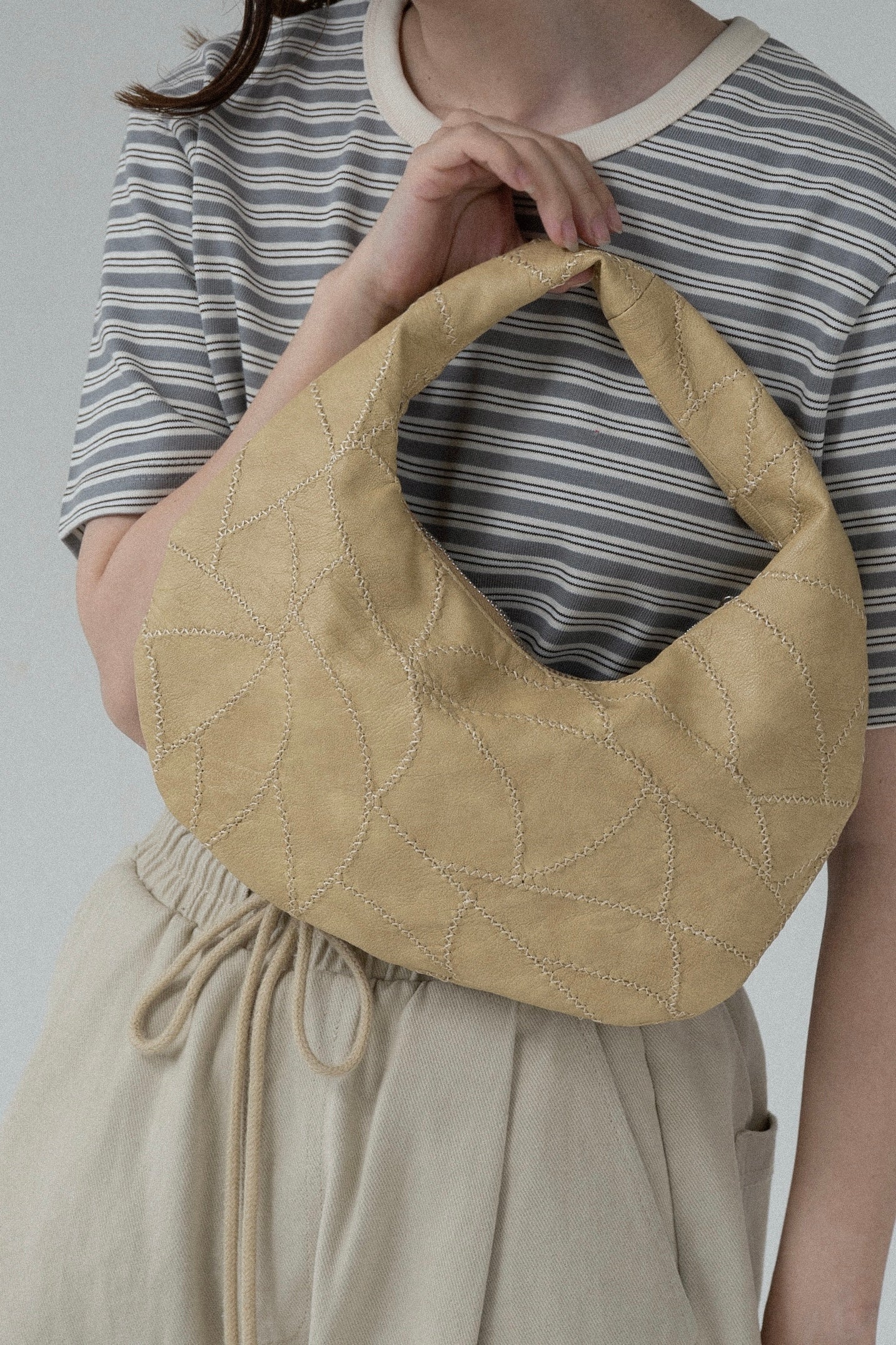 zigzag stitch patchwork oval bag