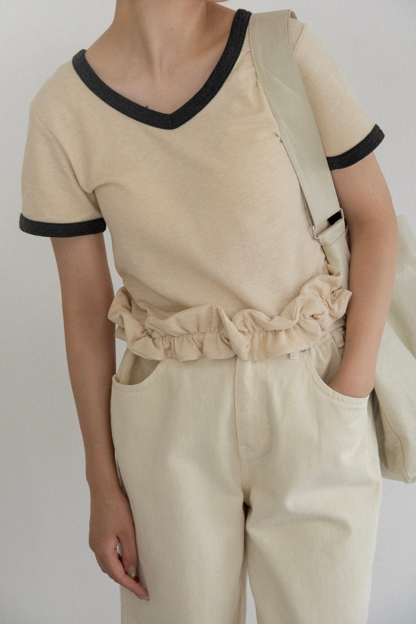 bicolor hem ruffle v tops