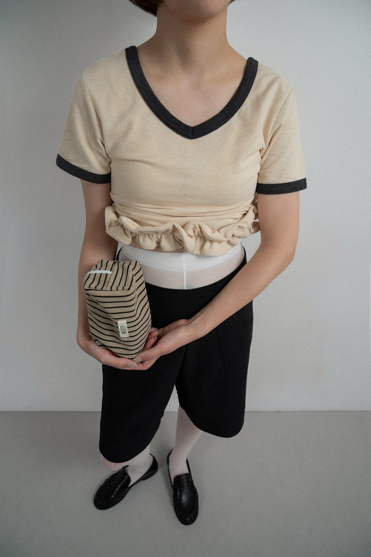 bicolor hem ruffle v tops