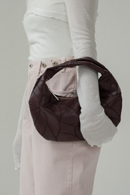 zigzag stitch patchwork oval bag