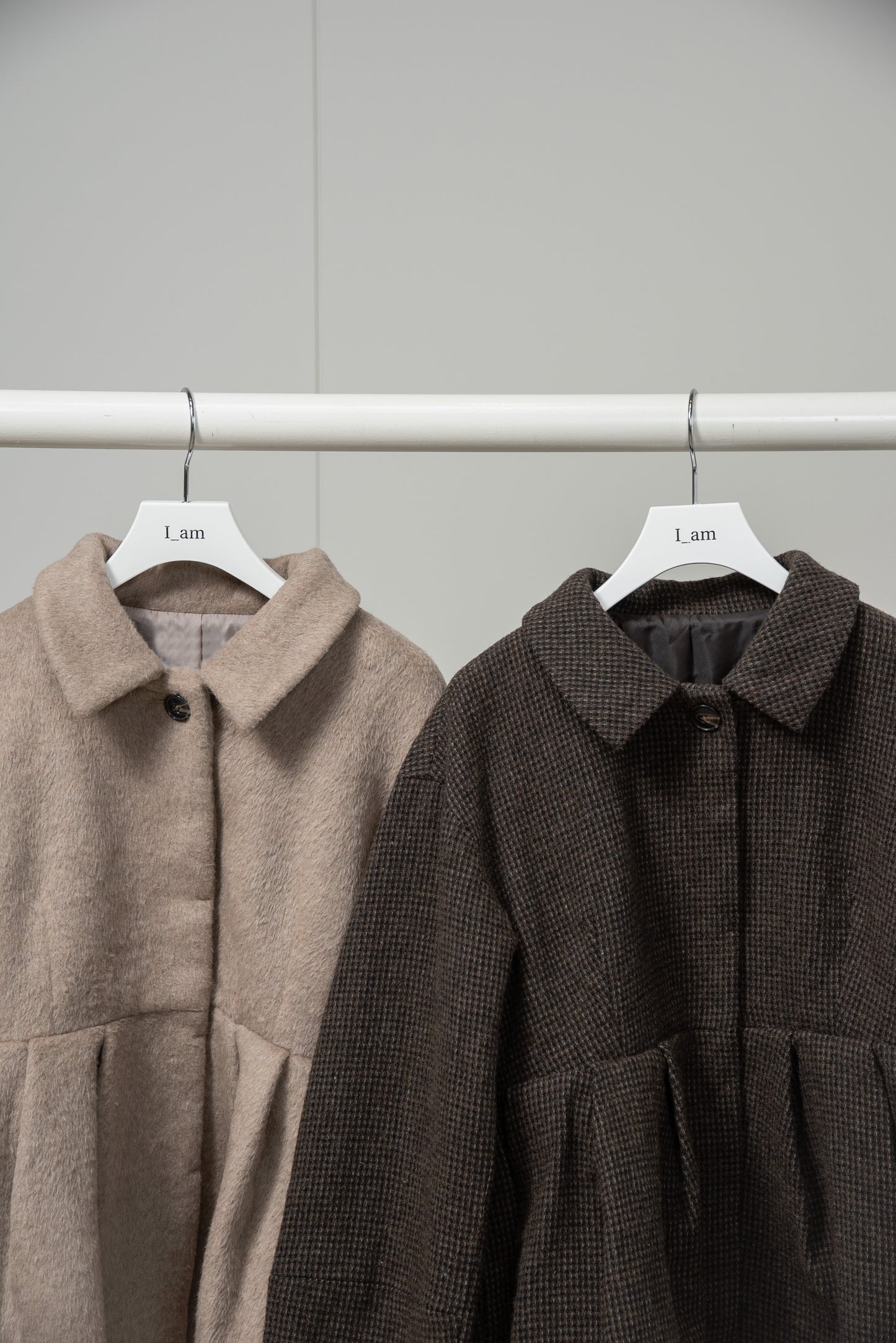 hidden button peplum flare coat