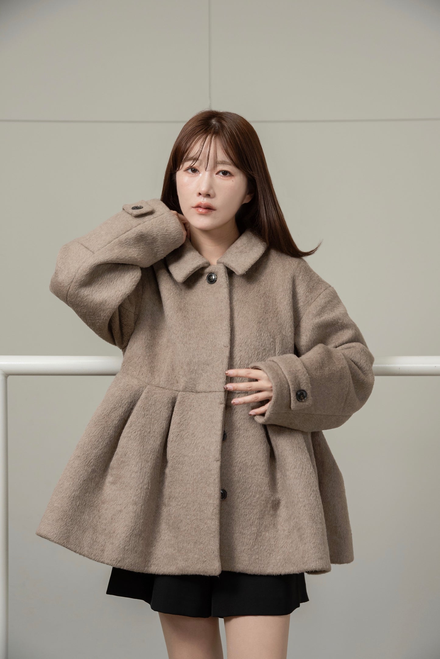 hidden button peplum flare coat