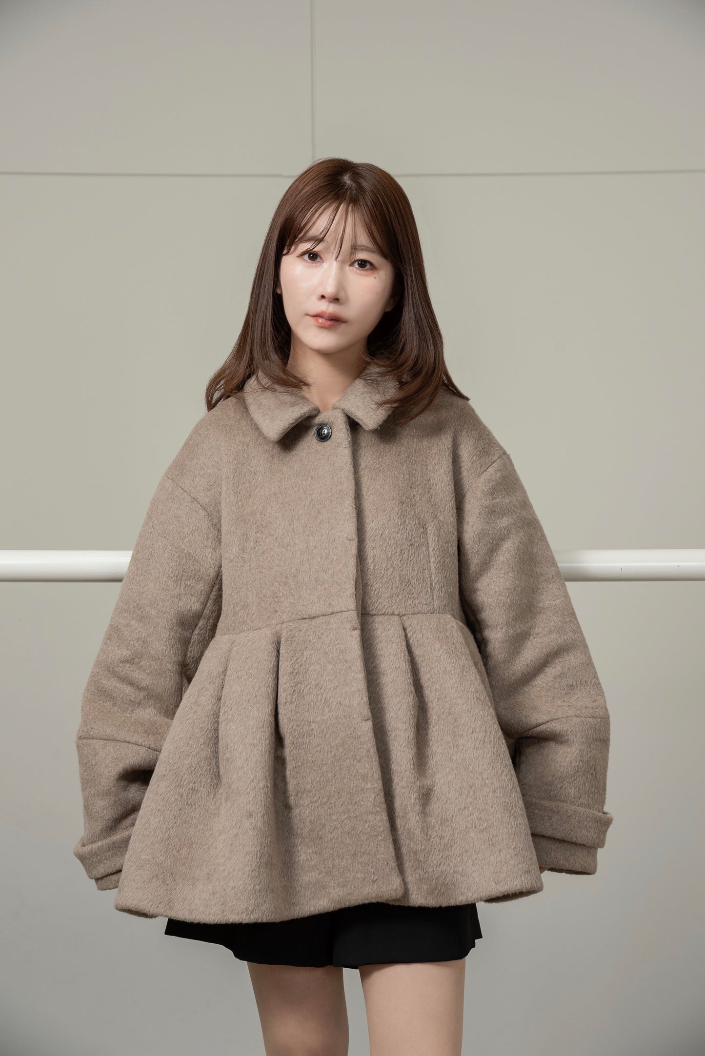 hidden button peplum flare coat