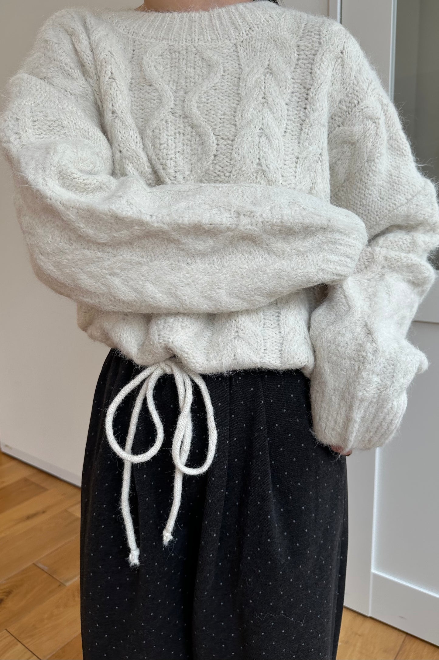 drop shoulder string cable knit