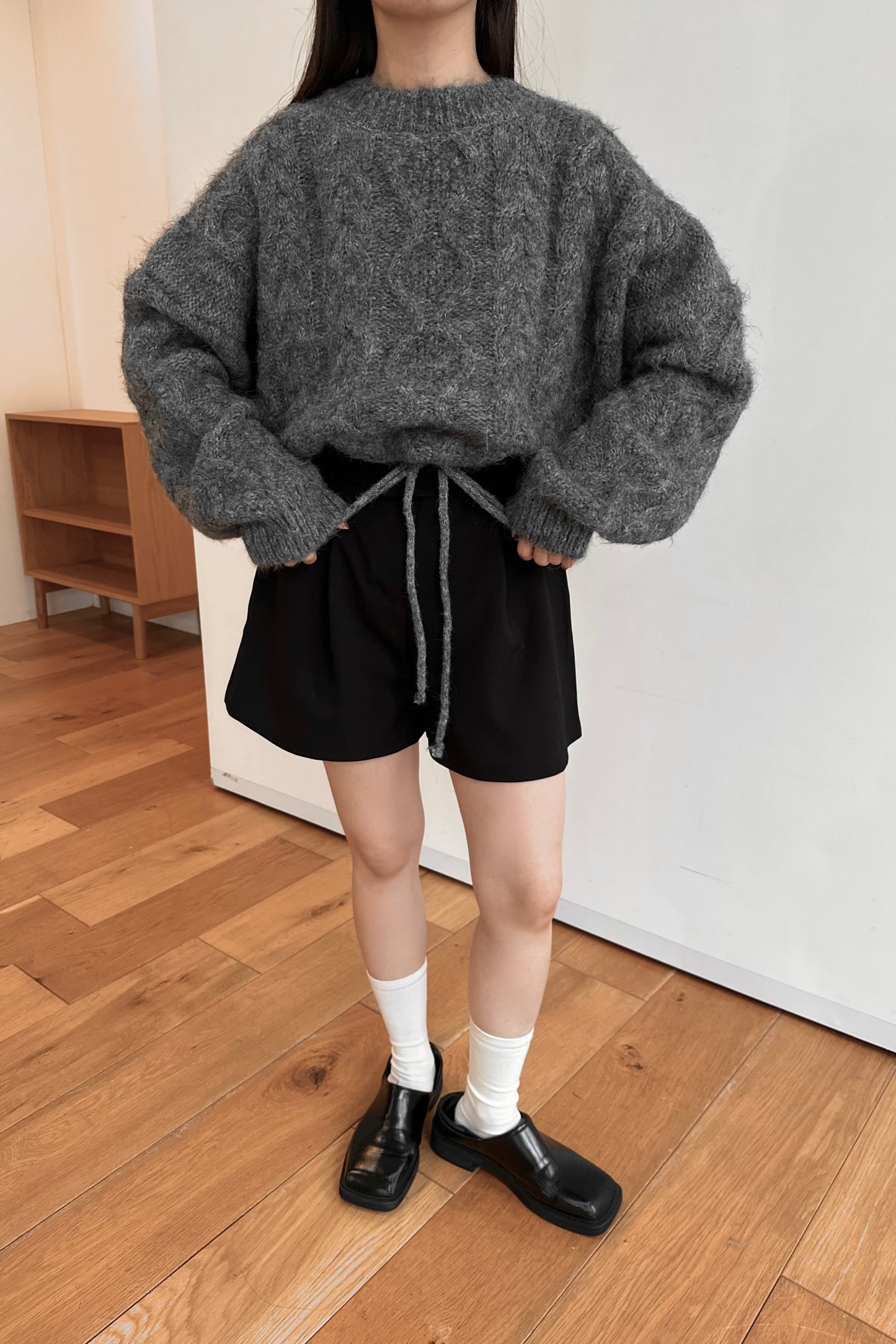 drop shoulder string cable knit