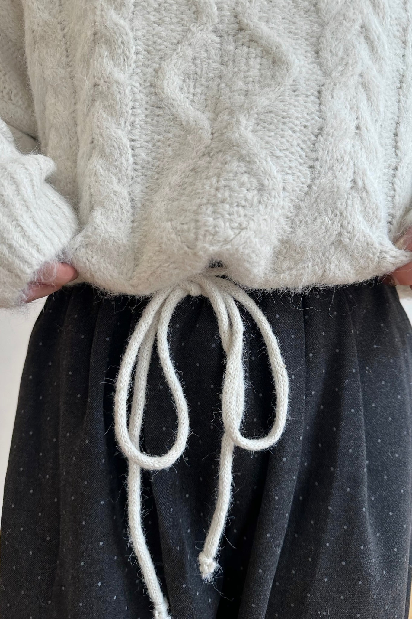 drop shoulder string cable knit