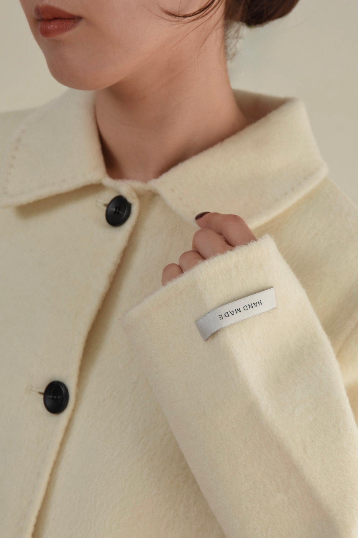 handmade stitch accent short coat