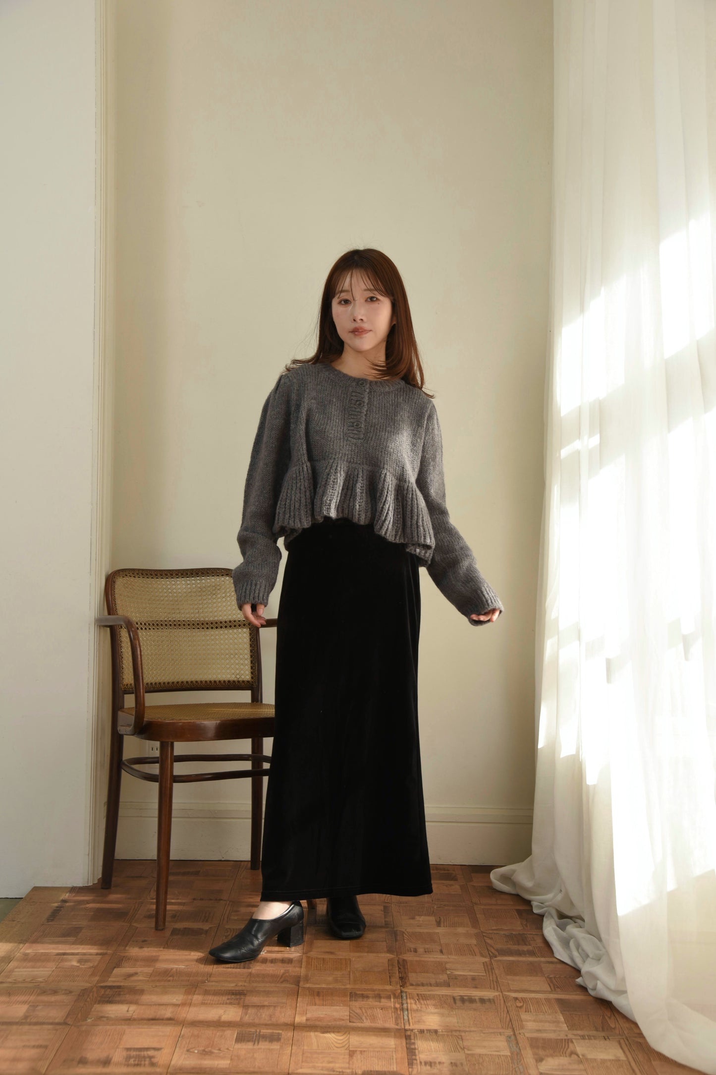 henry neck peplum hem knit