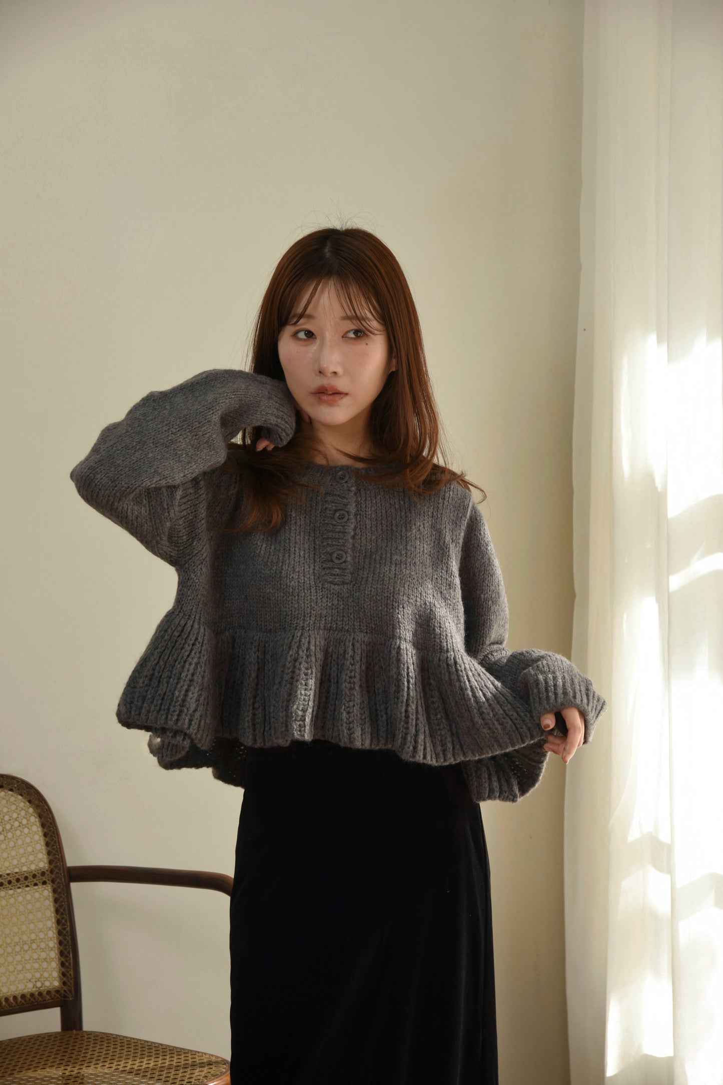 henry neck peplum hem knit