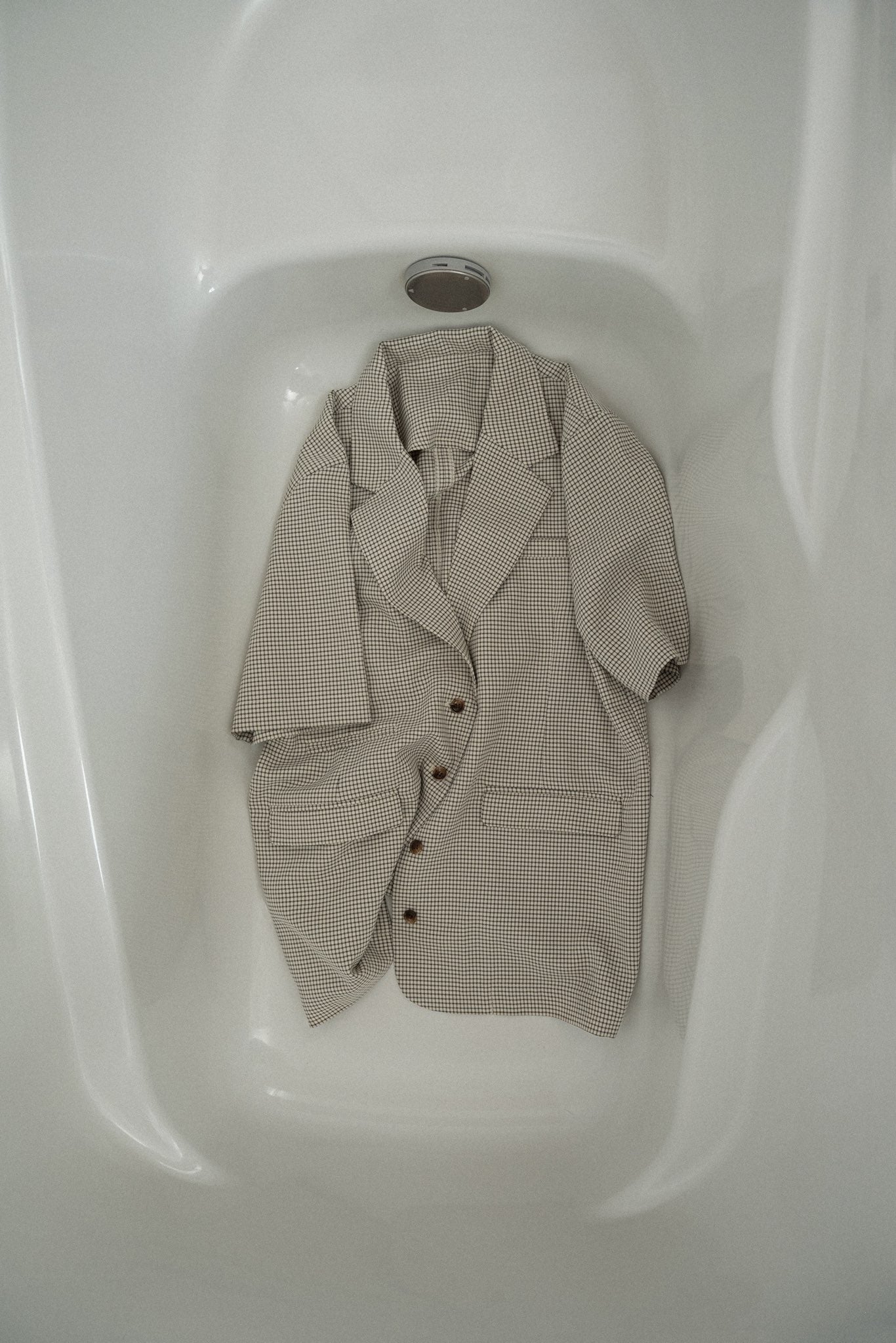 pocket point small button check jacket