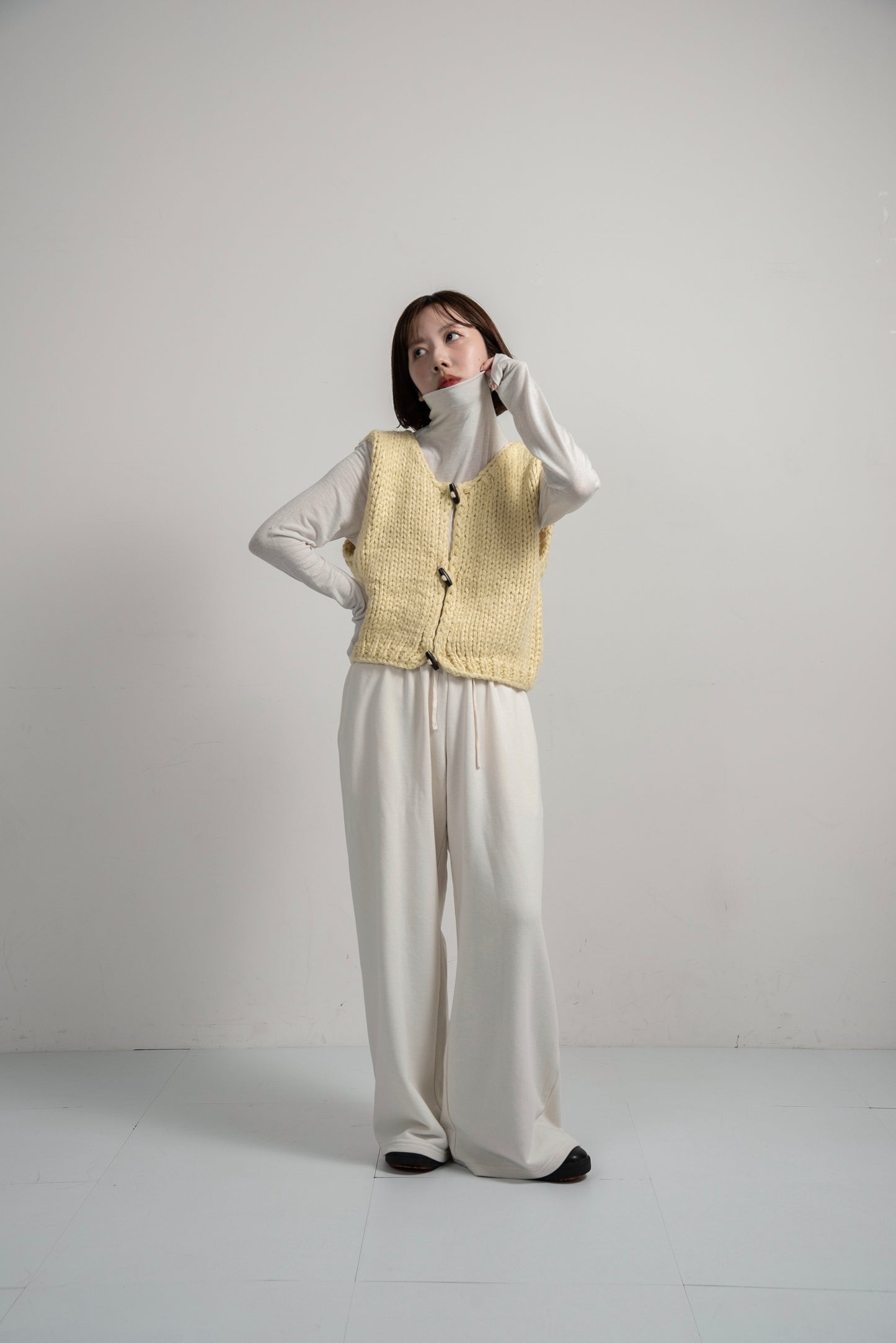 wood button chunky knit vest