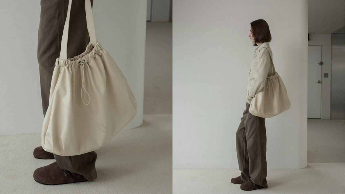 big circular form single handle gather bag