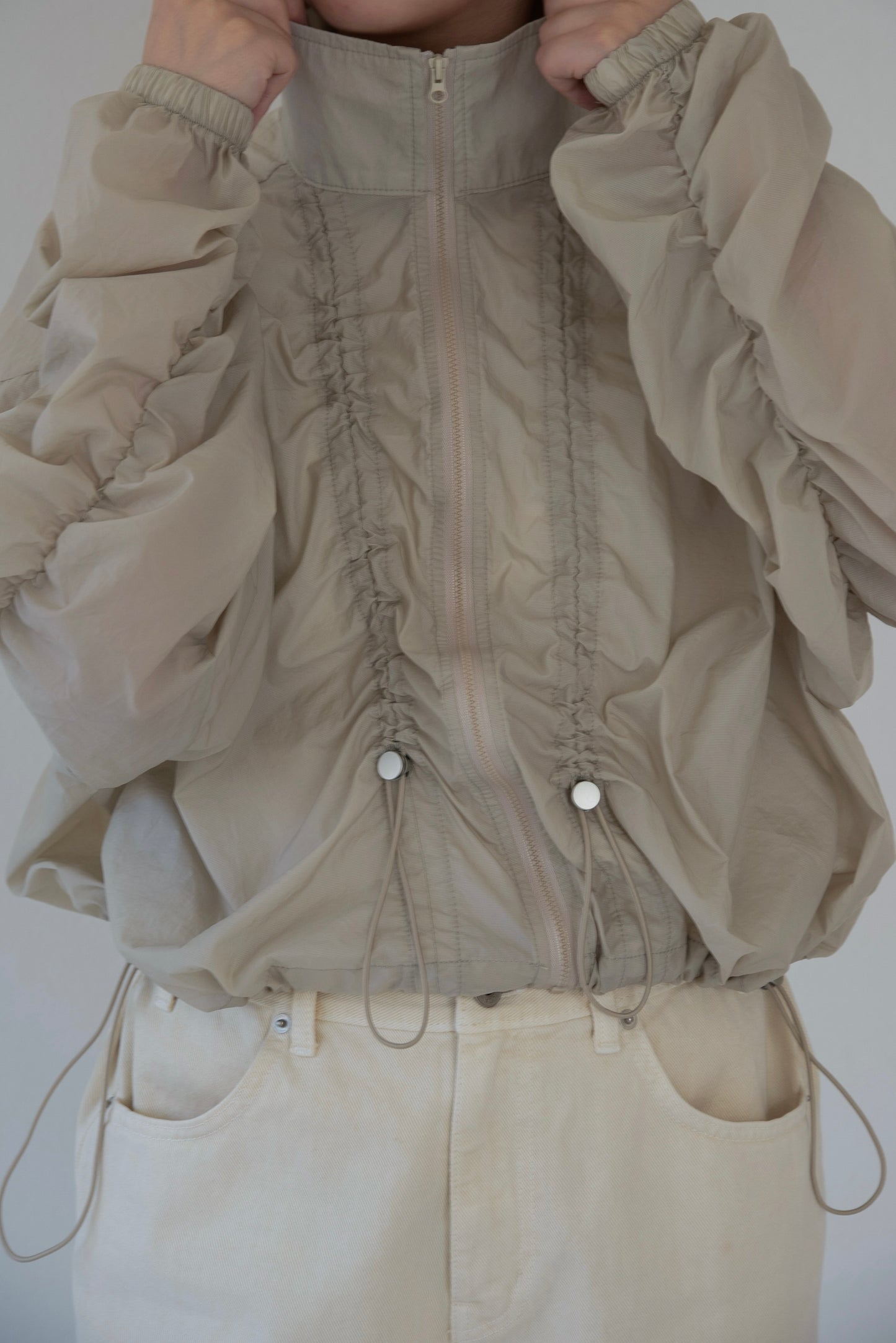 shirred sleeve front drawstring blouson