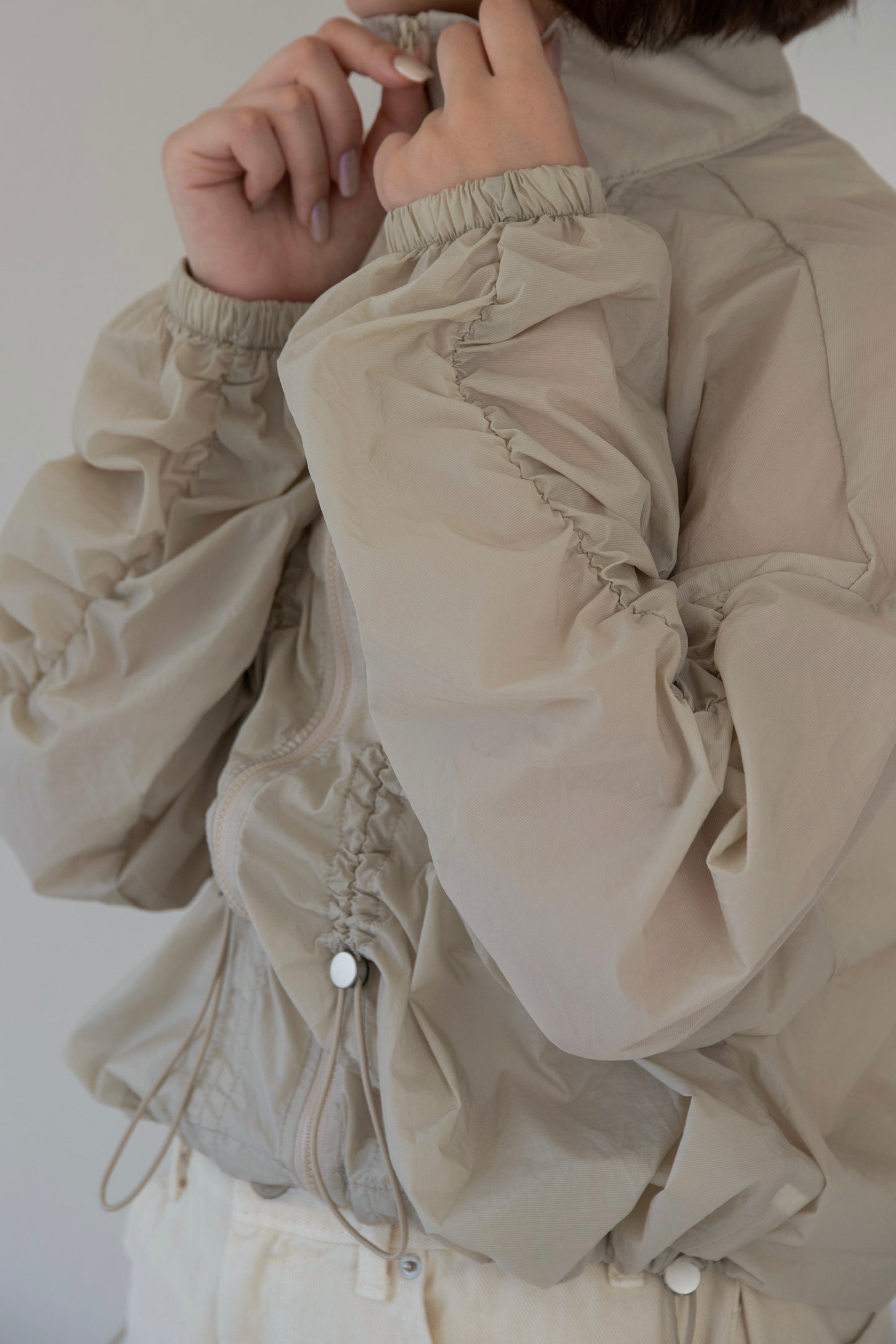 shirred sleeve front drawstring blouson