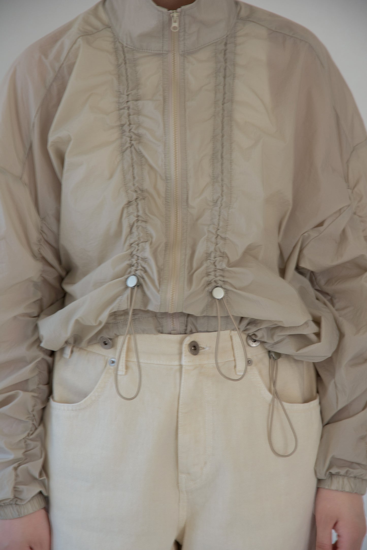 shirred sleeve front drawstring blouson