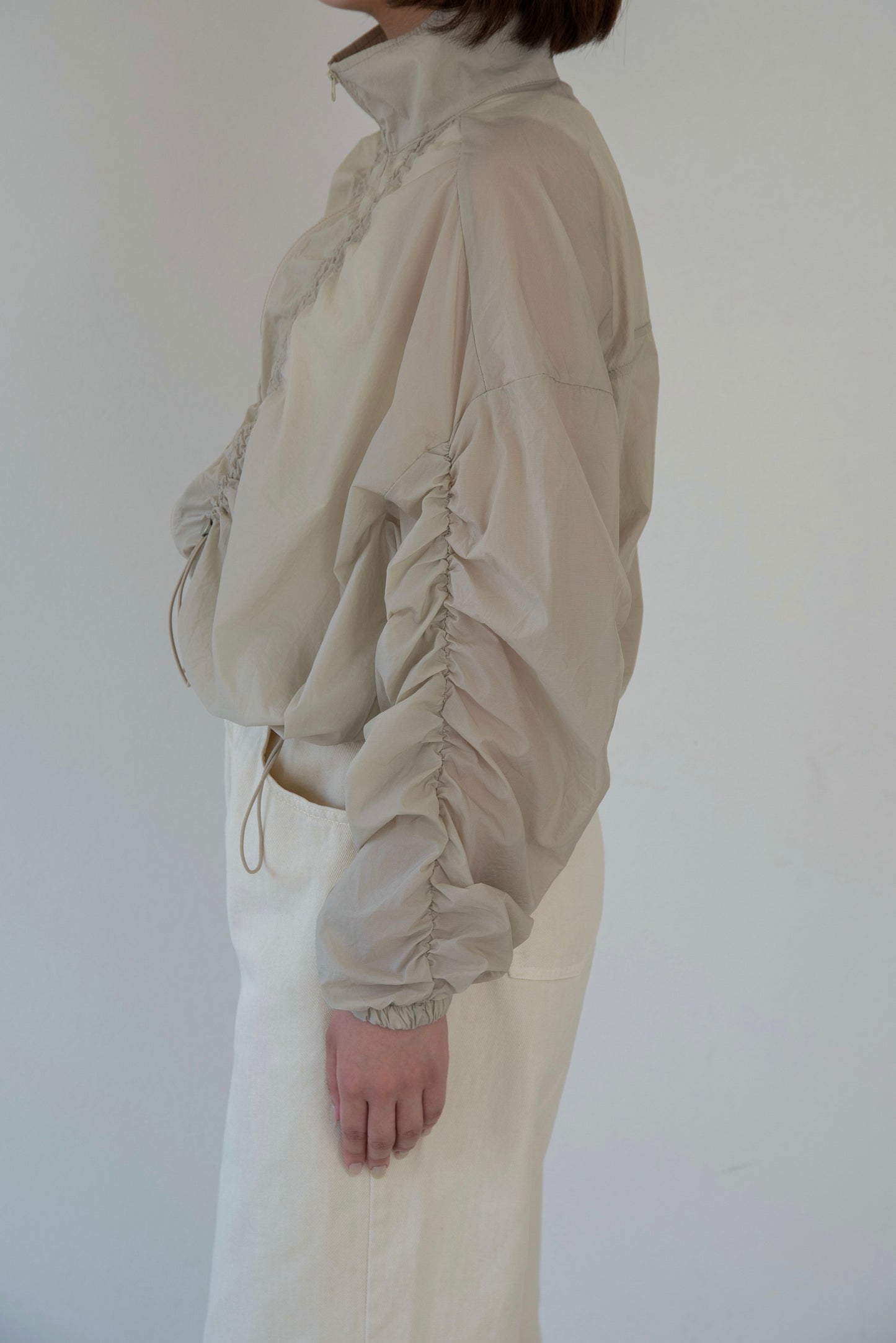 shirred sleeve front drawstring blouson