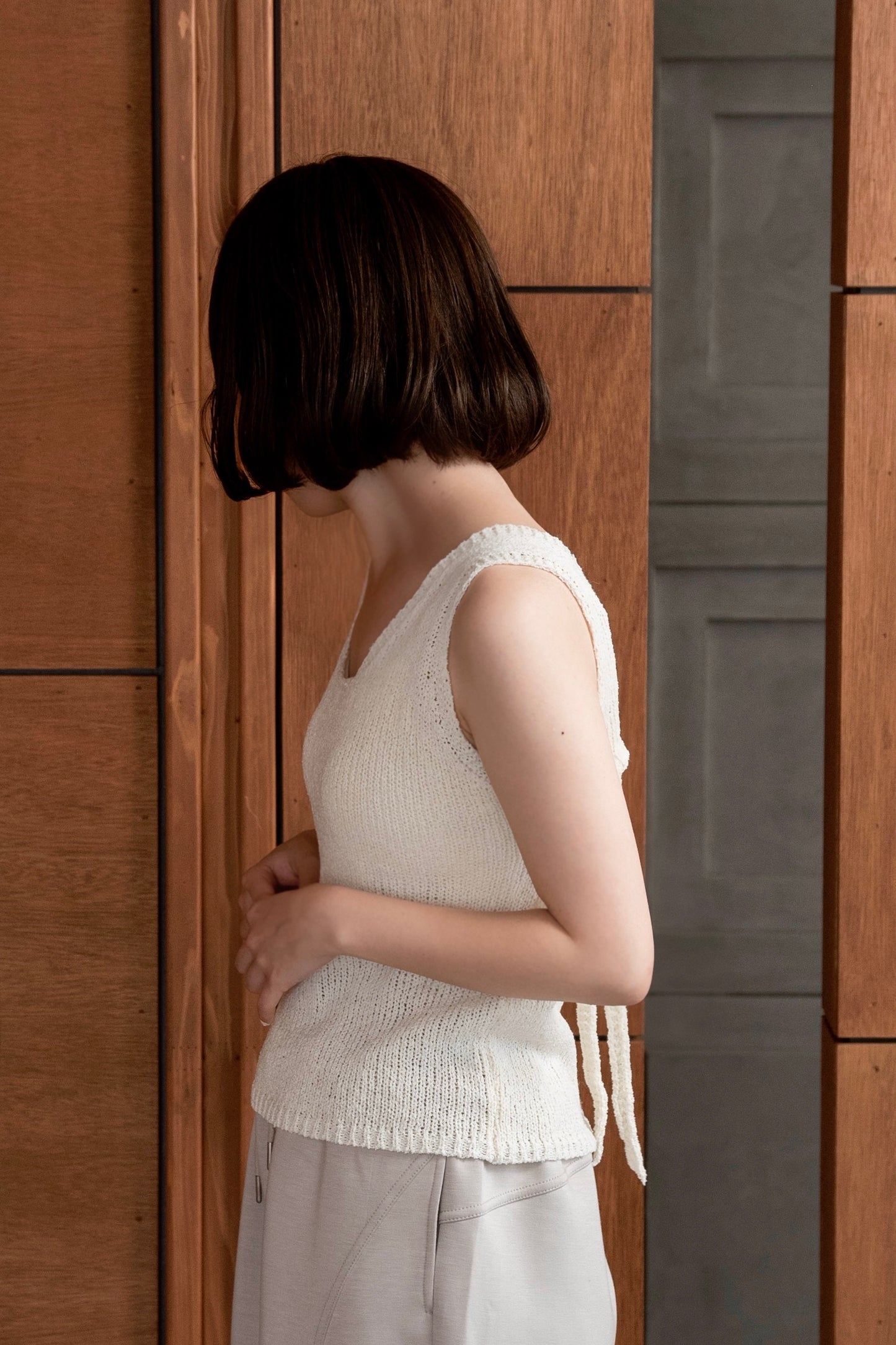 back open ribbon vest